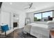 Bright bedroom with ensuite bathroom and wood floors at 4515 N 36Th Way, Phoenix, AZ 85018