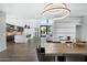 Modern dining area with an open floor plan and views into the kitchen at 4515 N 36Th Way, Phoenix, AZ 85018