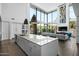 Open concept kitchen with a large island and views to the living room at 4515 N 36Th Way, Phoenix, AZ 85018