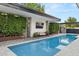 Long rectangular pool with a pergola and privacy hedges at 4515 N 36Th Way, Phoenix, AZ 85018