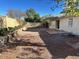 Large backyard with gravel and covered patio at 4534 E Muriel Dr, Phoenix, AZ 85032