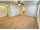 Large bedroom with wood-look floors and access to bathroom at 4534 E Muriel Dr, Phoenix, AZ 85032