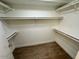 Spacious walk-in closet with double hanging rods and shelves at 4534 E Muriel Dr, Phoenix, AZ 85032