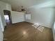 Open living room with vaulted ceiling and wood-look floors at 4534 E Muriel Dr, Phoenix, AZ 85032