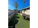 Large backyard with shed, hot tub, and artificial turf at 524 W Fairway Dr # 12, Mesa, AZ 85201