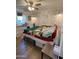 Main bedroom with brick feature wall and ample floor space at 524 W Fairway Dr # 12, Mesa, AZ 85201