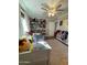 Bright bedroom with hardwood floors and built-in shelving at 524 W Fairway Dr # 12, Mesa, AZ 85201