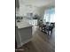 Modern kitchen with white cabinets and quartz countertops at 524 W Fairway Dr # 12, Mesa, AZ 85201