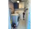Bright laundry room with washer, dryer, and cabinets at 524 W Fairway Dr # 12, Mesa, AZ 85201