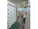 Clean bathroom with shower/tub combo and updated vanity at 524 W Fairway Dr # 13, Mesa, AZ 85201