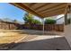 Backyard with covered patio and gravel landscaping at 5518 W Mercury Way, Chandler, AZ 85226