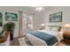 Charming bedroom with wood floors and plenty of natural light at 5518 W Mercury Way, Chandler, AZ 85226