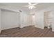 Bedroom with wood-look floors and private bathroom access at 5518 W Mercury Way, Chandler, AZ 85226