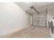 Garage interior with storage cabinets and pegboard at 5518 W Mercury Way, Chandler, AZ 85226