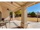 Covered patio with seating area, overlooking backyard at 5731 W Aster Dr, Glendale, AZ 85304