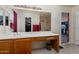 Main bathroom with double sinks, large mirror, and separate shower at 5731 W Aster Dr, Glendale, AZ 85304