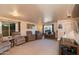 Living room with comfortable seating and a view of the entryway at 5731 W Aster Dr, Glendale, AZ 85304