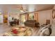 Open living space with kitchen access, and comfortable seating area at 5731 W Aster Dr, Glendale, AZ 85304