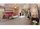 Large Primary bedroom with king-size bed and private office space at 5731 W Aster Dr, Glendale, AZ 85304