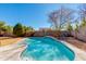 Relaxing kidney-shaped pool, perfect for summer fun at 5731 W Aster Dr, Glendale, AZ 85304