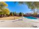Inviting swimming pool with large backyard and patio at 5731 W Aster Dr, Glendale, AZ 85304