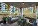 Private balcony with city views and comfortable patio furniture at 7120 E Kierland Blvd # 218, Scottsdale, AZ 85254