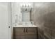 Stylish bathroom featuring a wood vanity and contemporary fixtures at 7120 E Kierland Blvd # 218, Scottsdale, AZ 85254