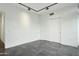 Bedroom with large closet and grey tile floors at 7120 E Kierland Blvd # 218, Scottsdale, AZ 85254
