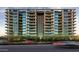 Modern high-rise building with city views and landscaped grounds at 7120 E Kierland Blvd # 218, Scottsdale, AZ 85254
