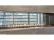Modern linear fireplace with glass and stone surround at 7120 E Kierland Blvd # 218, Scottsdale, AZ 85254