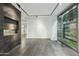 Modern living room with floor to ceiling windows and a cozy fireplace at 7120 E Kierland Blvd # 218, Scottsdale, AZ 85254