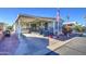 Mobile home with covered porch and spacious yard at 7750 E Broadway Rd # 156, Mesa, AZ 85208