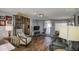 Spacious living room with hardwood floors and access to patio at 7750 E Broadway Rd # 156, Mesa, AZ 85208