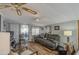 Relaxing living room with hardwood floors and sliding glass doors at 7750 E Broadway Rd # 156, Mesa, AZ 85208