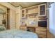 Bedroom with mirrored vanity and tv at 7750 E Broadway Rd # 495, Mesa, AZ 85208