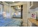 Bright bedroom with mirrored closet doors and built-in dresser at 7750 E Broadway Rd # 495, Mesa, AZ 85208