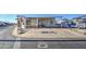 Mobile home with covered patio and parking at 7750 E Broadway Rd # 495, Mesa, AZ 85208