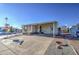 Mobile home with covered patio and parking at 7750 E Broadway Rd # 495, Mesa, AZ 85208