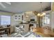 Kitchen and dining area with a wooden table and chairs at 7750 E Broadway Rd # 495, Mesa, AZ 85208