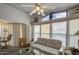 Spacious living room with large windows and seating area at 7750 E Broadway Rd # 495, Mesa, AZ 85208