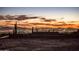 Sunset view of city lights and mountains from a construction site at 11098 E Whistling Wind Way # 1851, Scottsdale, AZ 85255