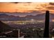 Nighttime city lights and mountain views from a hillside property at 11098 E Whistling Wind Way, Scottsdale, AZ 85255