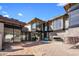 Modern home under construction with large windows and a courtyard at 11098 E Whistling Wind Way # 1851, Scottsdale, AZ 85255