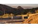 Property under construction, with mountain backdrop at 11098 E Whistling Wind Way, Scottsdale, AZ 85255