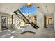 Modern metal staircase with a glass and skylight feature at 11098 E Whistling Wind Way # 1851, Scottsdale, AZ 85255