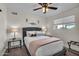 Guest bedroom with a full-size bed, nightstands, and ceiling fan at 1142 E Westchester Dr, Tempe, AZ 85283