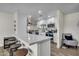 Modern kitchen with white cabinets and a breakfast bar at 1142 E Westchester Dr, Tempe, AZ 85283