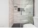 Clean shower with modern tile and glass enclosure at 11514 W Charter Oak Rd, El Mirage, AZ 85335