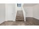 Interior staircase with tile flooring and white walls at 11514 W Charter Oak Rd, El Mirage, AZ 85335