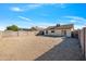 Large gravel backyard with block wall fencing at 11782 W Columbine Dr, El Mirage, AZ 85335